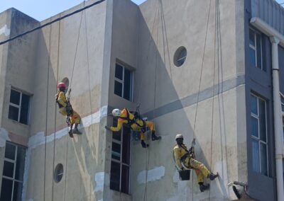 Concrete surface restoration and spalling repair application on building wall in Durban