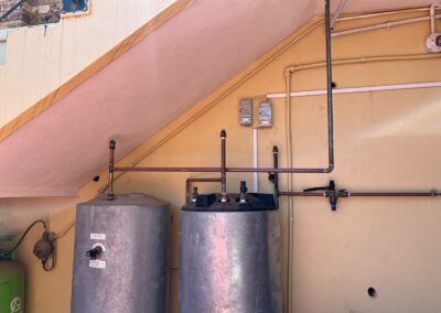 Professional plumber in Durban installing hot water geyser plumbing system